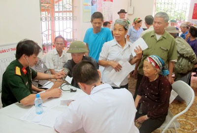 A blood donation event with people donating blood.2