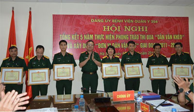 A blood donation event with people donating blood.2