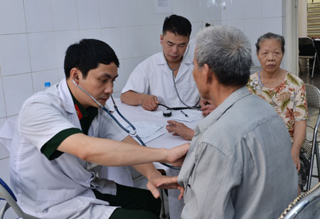 A blood donation event with people donating blood.2