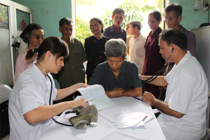 A blood donation event with people donating blood.2