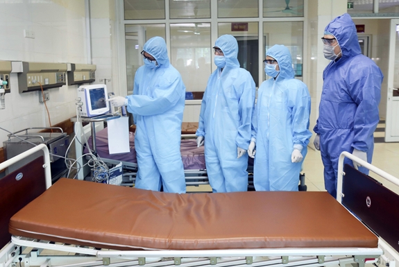 A blood donation event with people donating blood.2