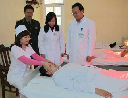 A blood donation event with people donating blood.2