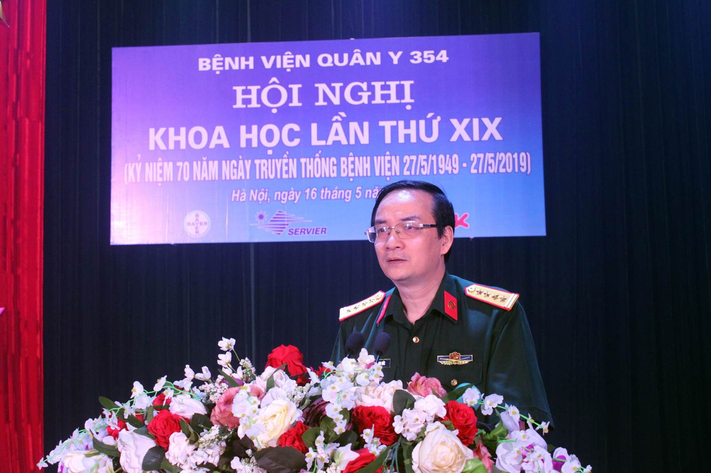 A blood donation event with people donating blood.2