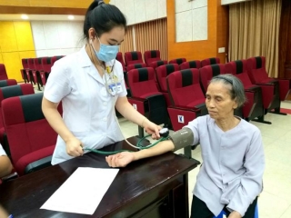 A blood donation event with people donating blood.2