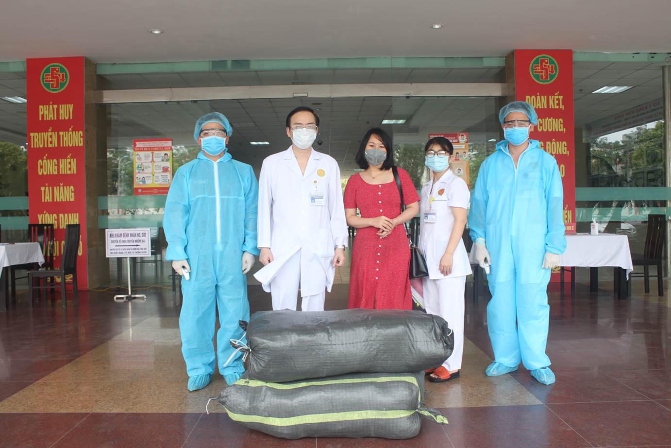 A blood donation event with people donating blood.2