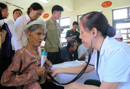 A blood donation event with people donating blood.2