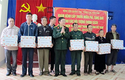 A blood donation event with people donating blood.2