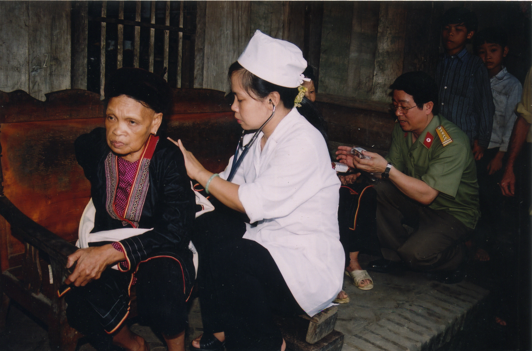 A blood donation event with people donating blood.2