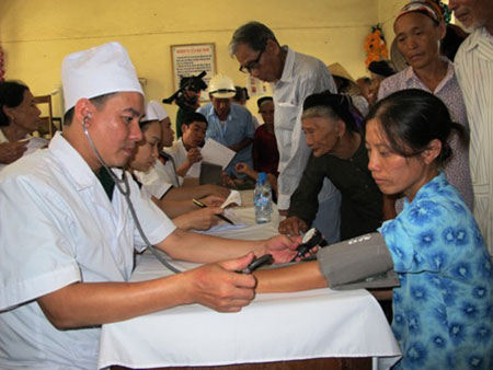 A blood donation event with people donating blood.2