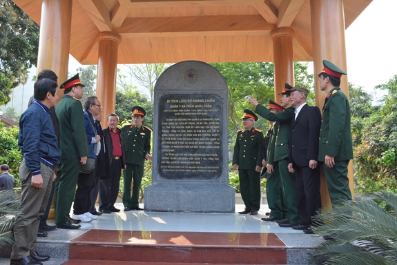 A blood donation event with people donating blood.2