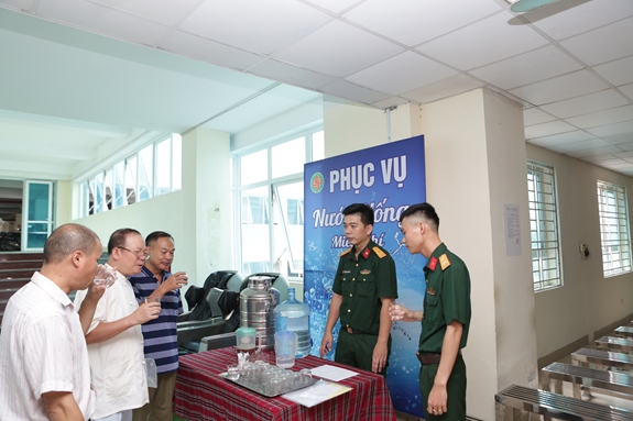 A blood donation event with people donating blood.2