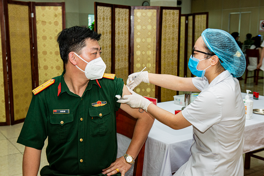 A blood donation event with people donating blood.2
