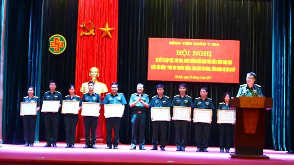 A blood donation event with people donating blood.2