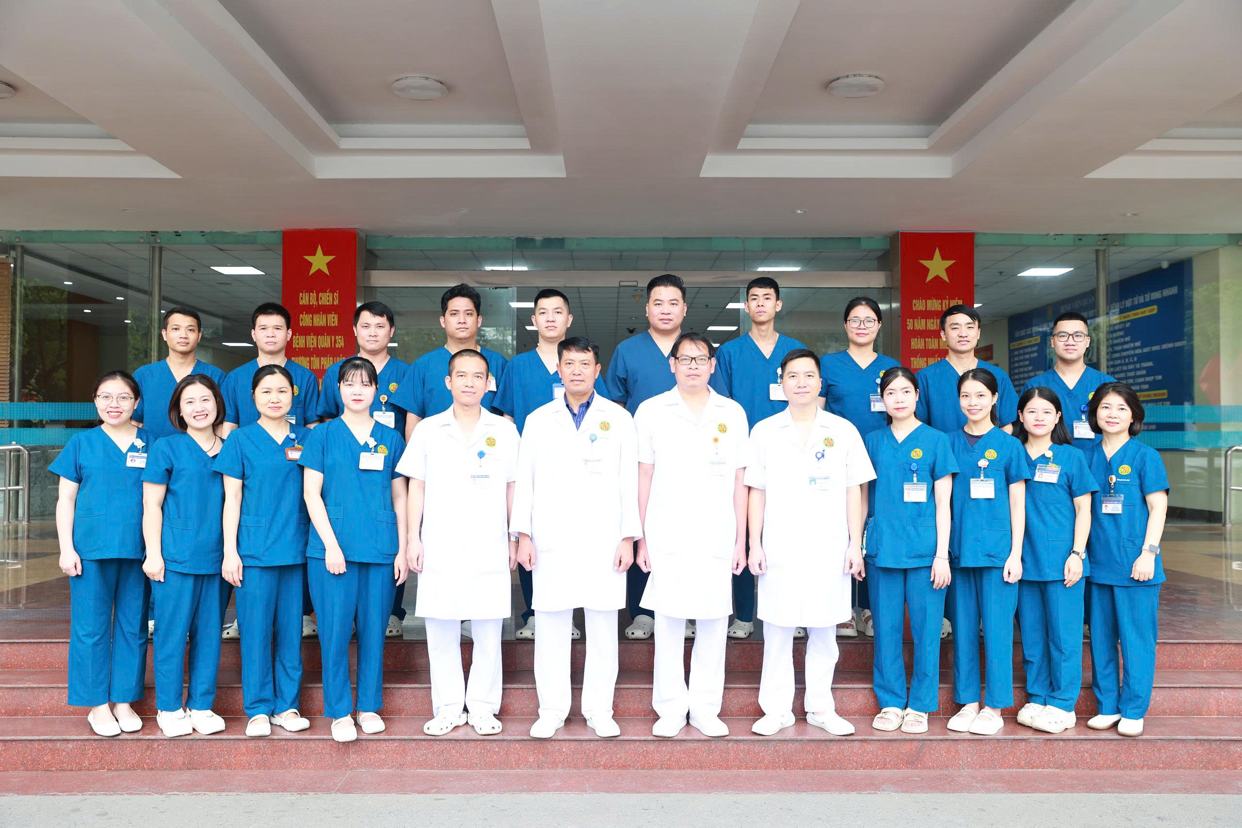 Group of medical staff standing together in a hospital setting