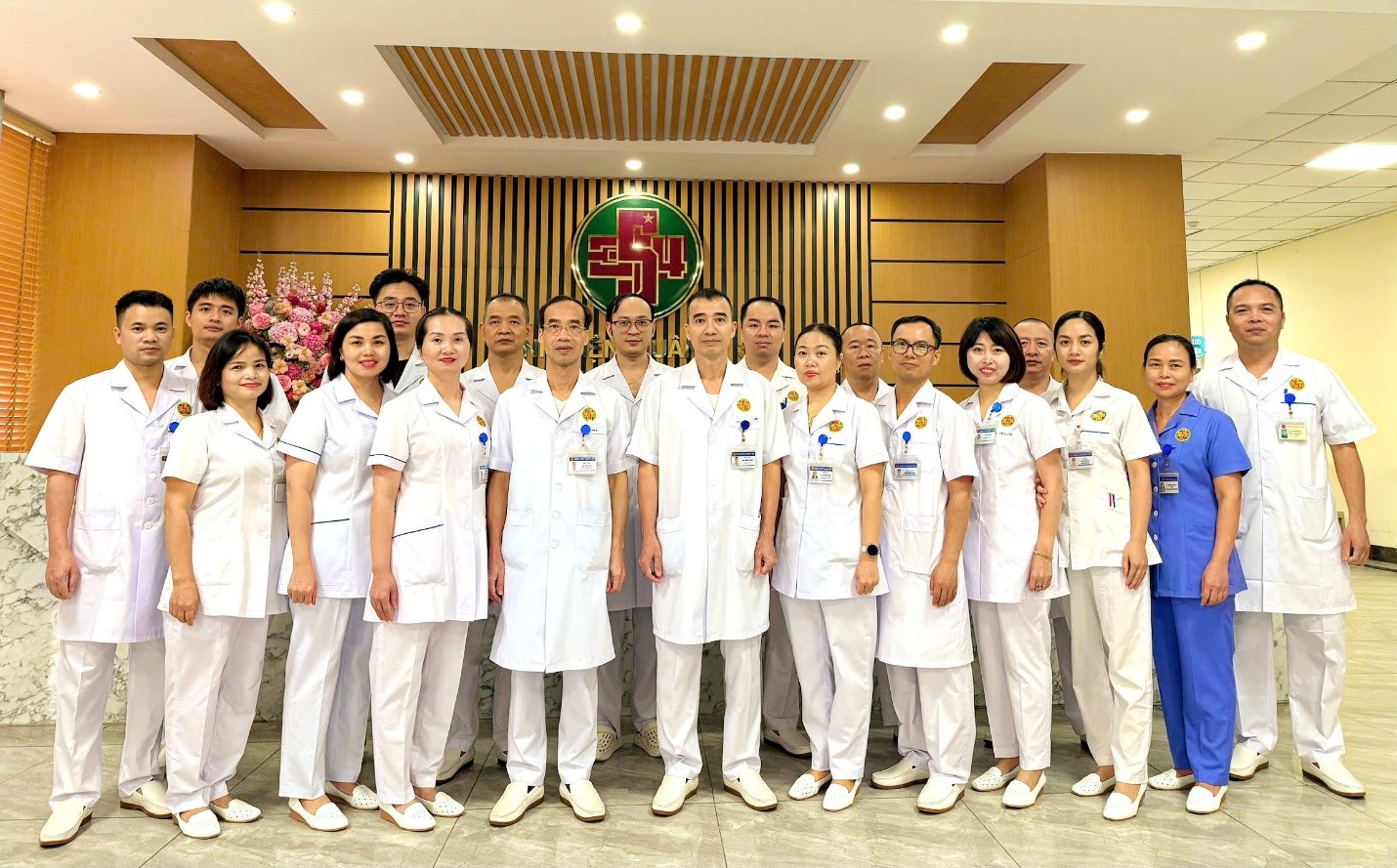 Group of medical staff standing together in a hospital setting