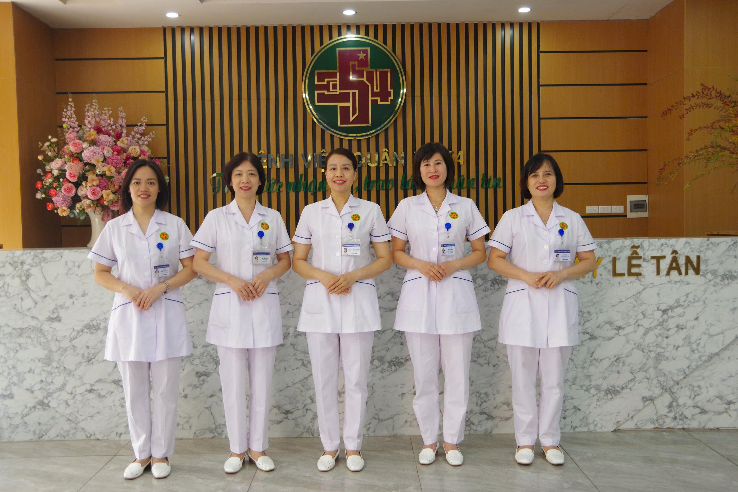 Group of medical staff standing together in a hospital setting