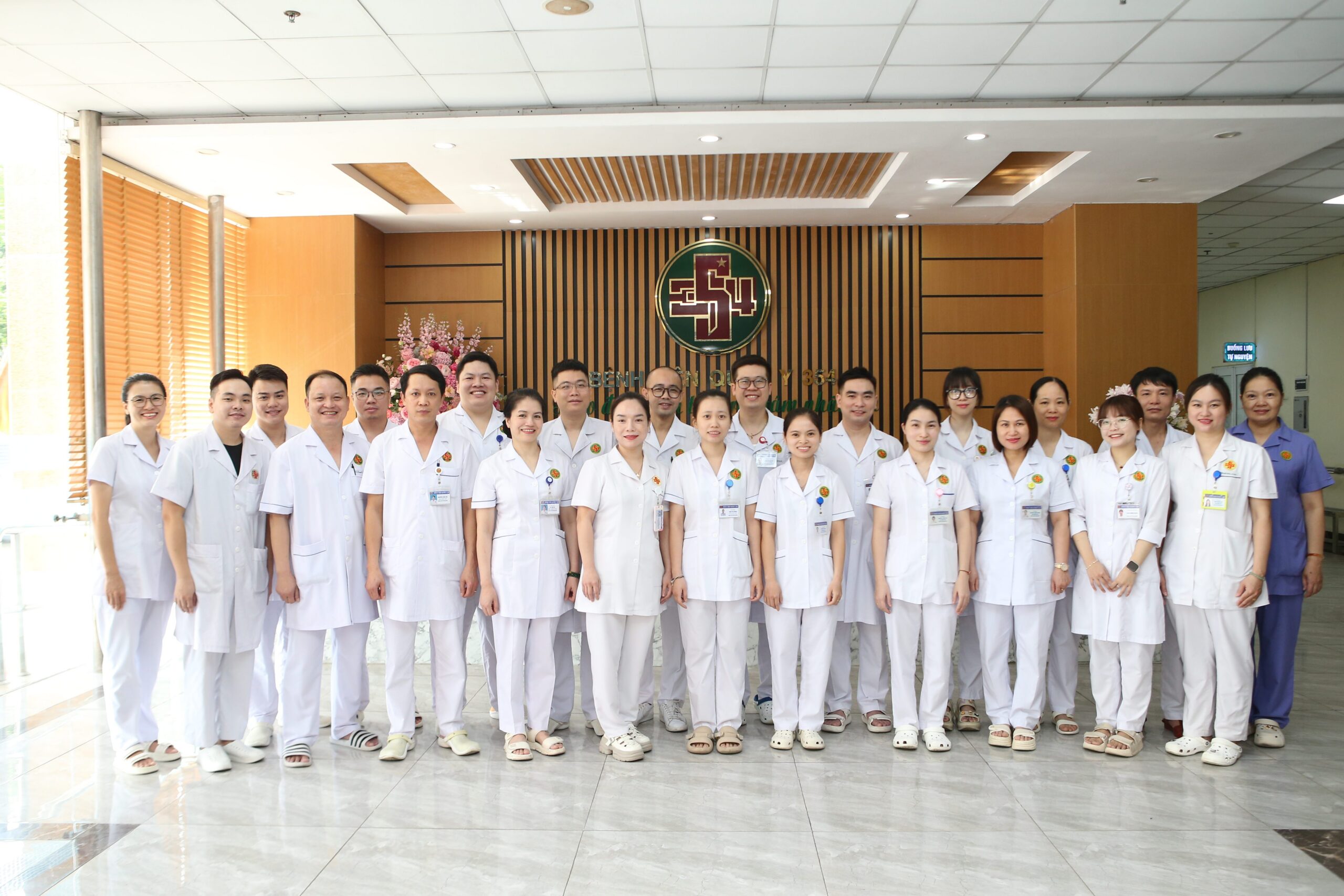 Group of medical staff standing together in a hospital setting