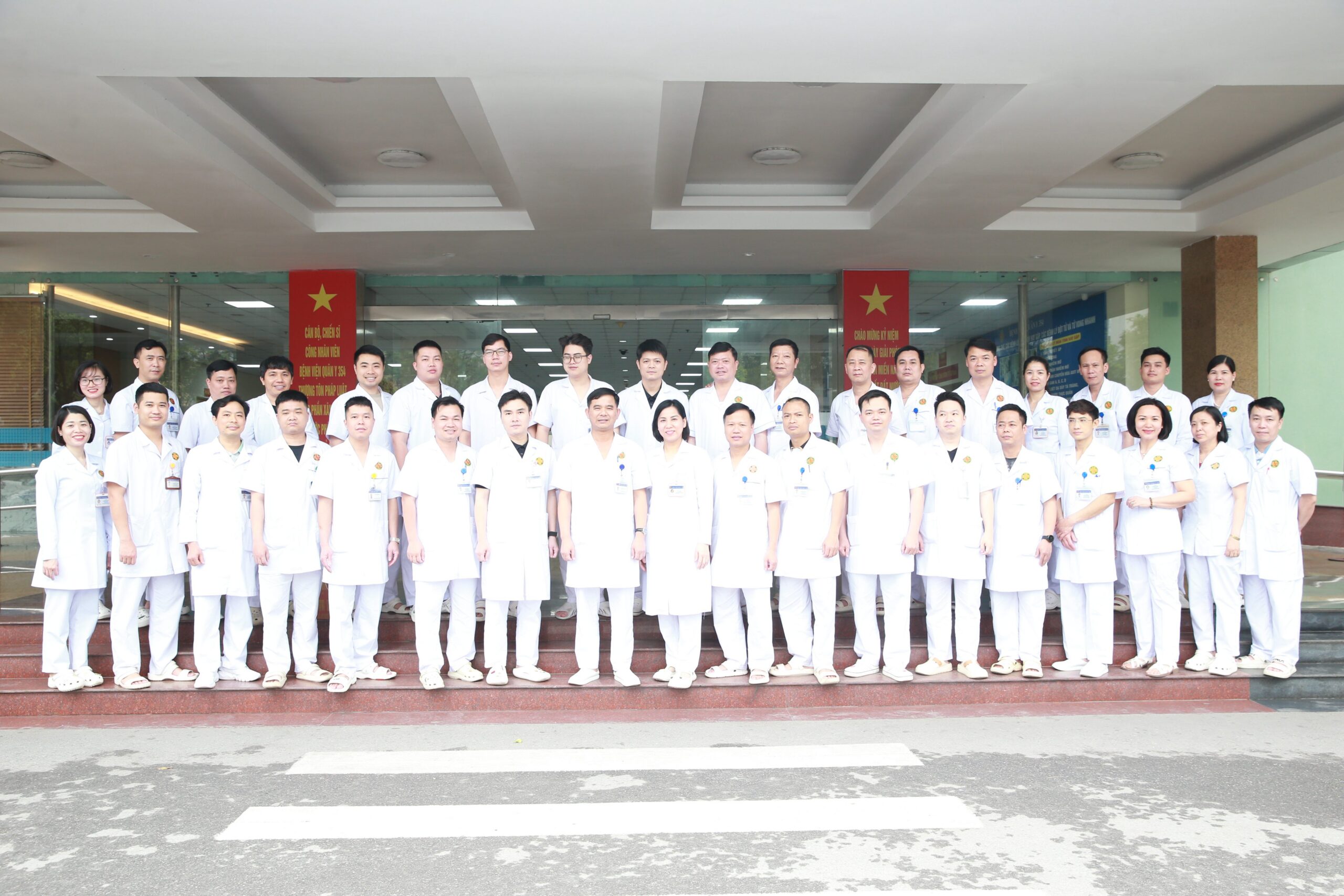 Group of medical staff standing together in a hospital setting