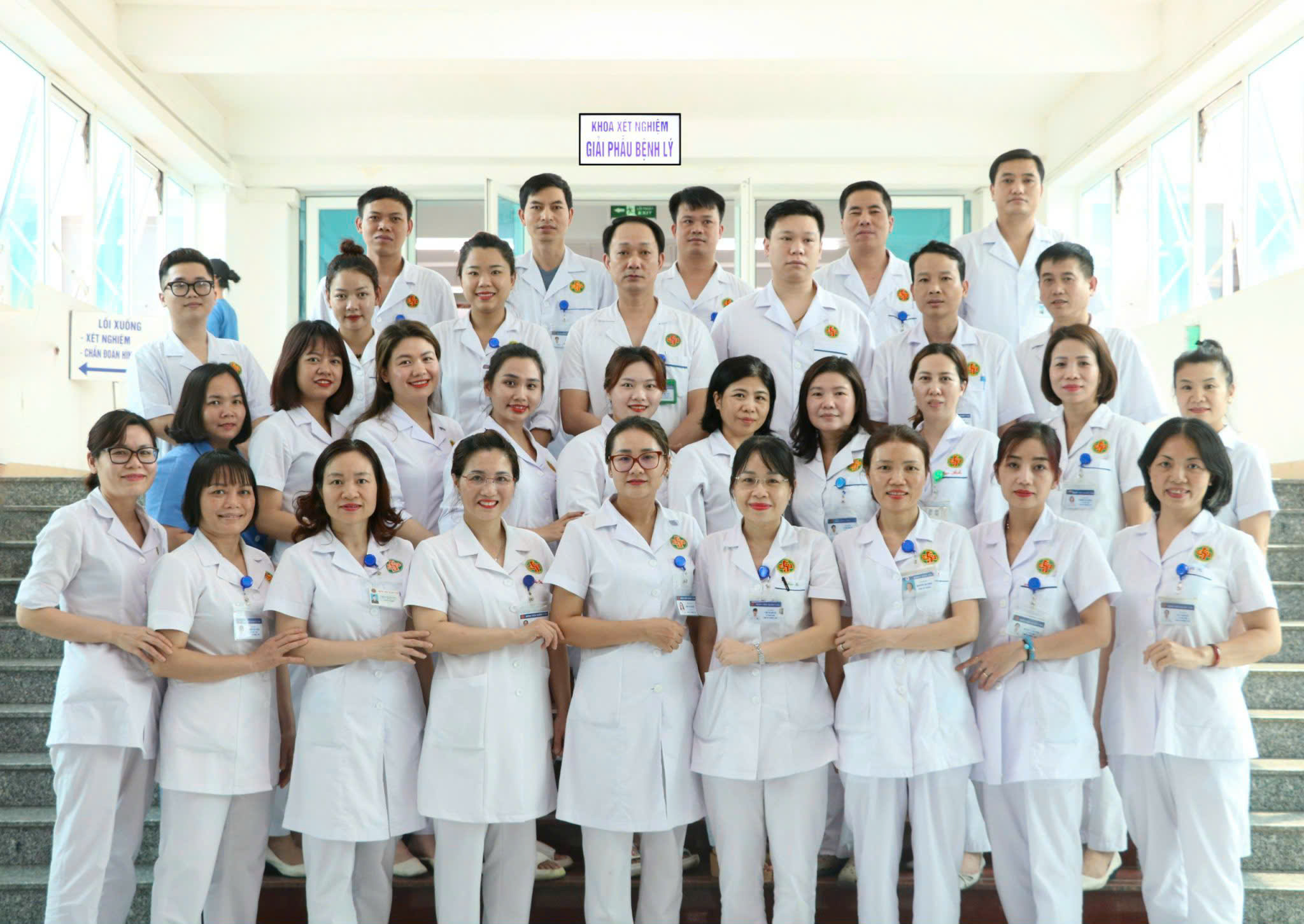 Group of medical staff standing together in a hospital setting