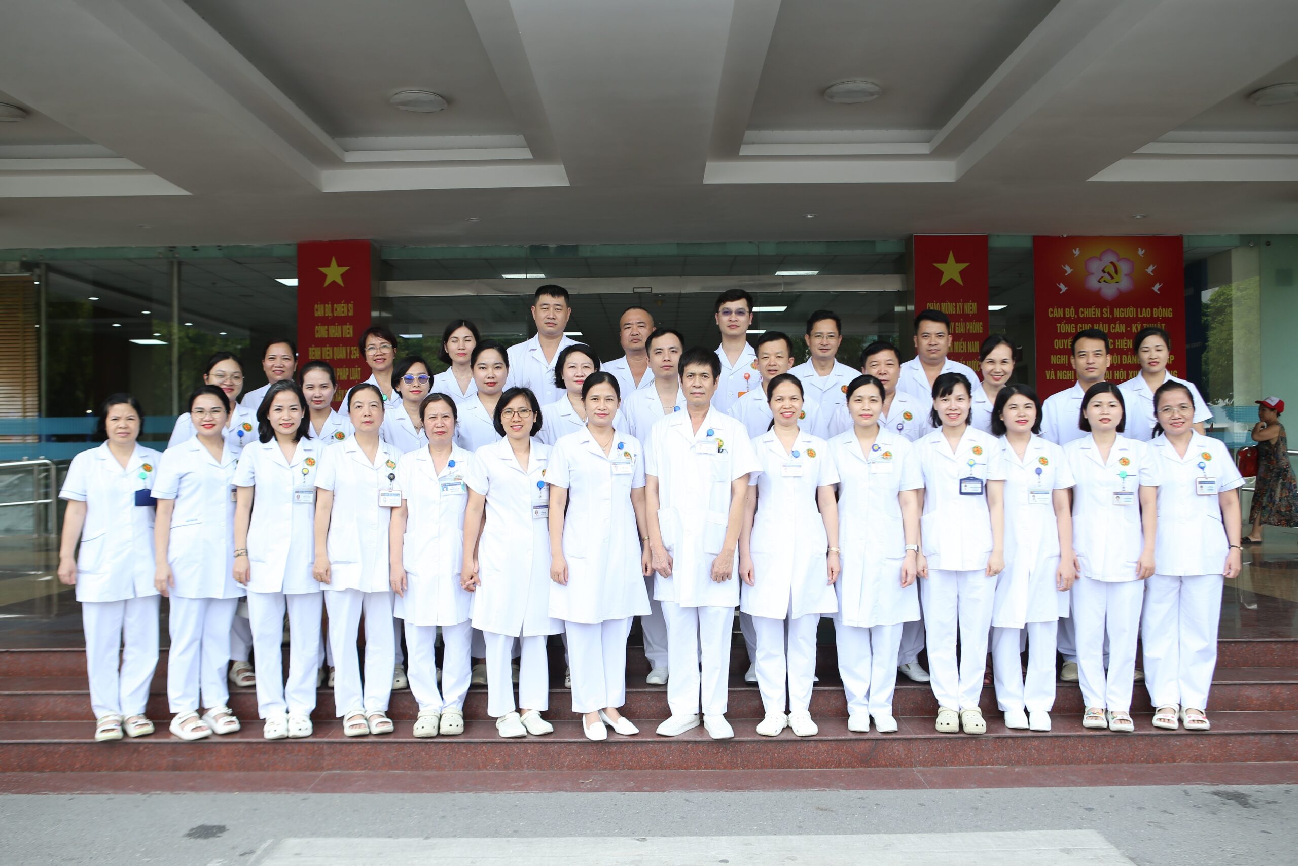 Group of medical staff standing together in a hospital setting
