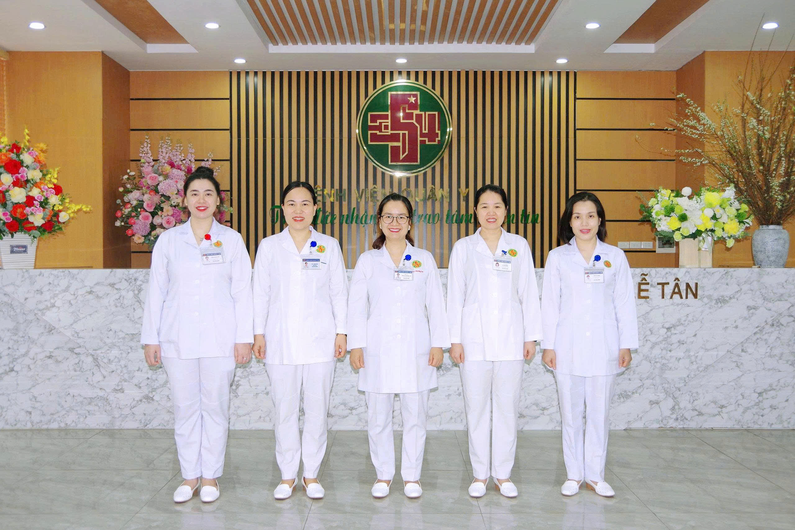Group of medical staff standing together in a hospital setting