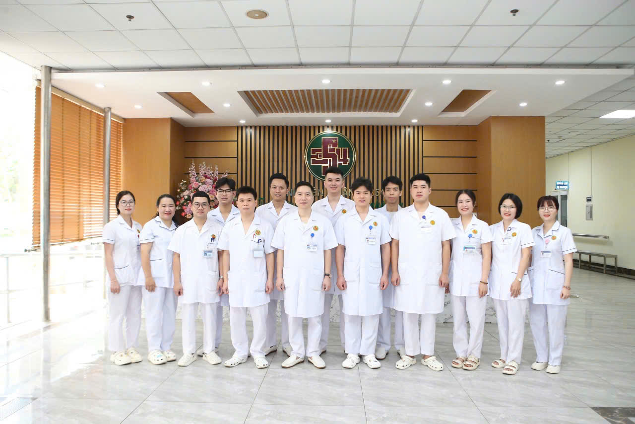 Group of medical staff standing together in a hospital setting